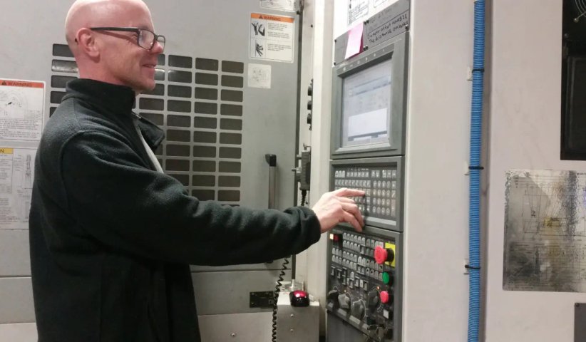 Photo of Elecrician working on a electrical panel
