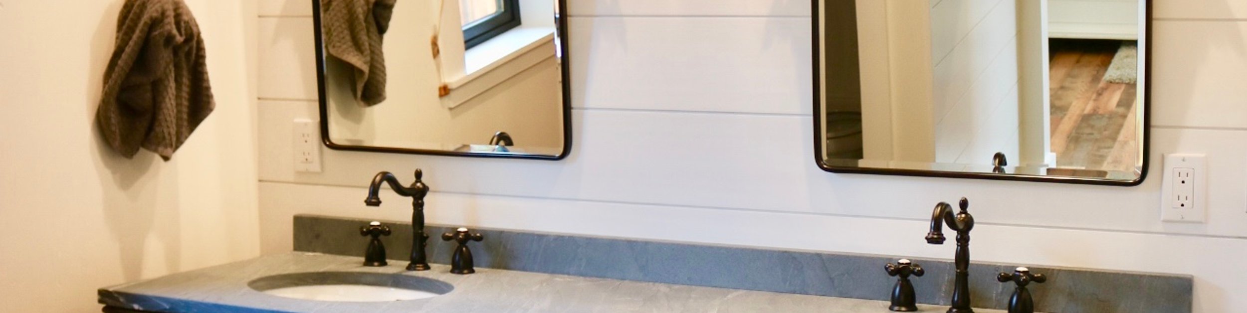 Bathroom outlets and fixture wiring checked by LoDolce Electric