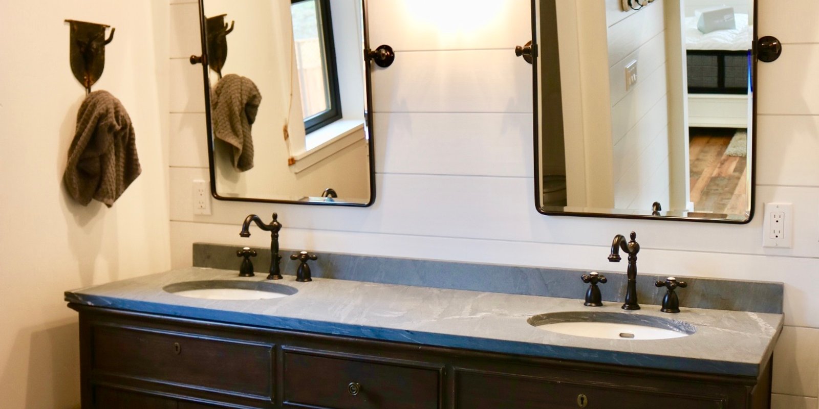 Bathroom outlets and fixture wiring checked by LoDolce Electric